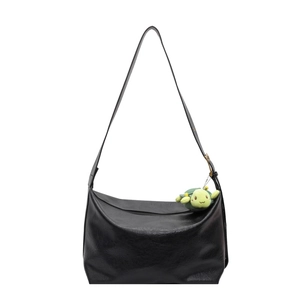 Retro black leather tote bag with adjustable strap and green plush turtle charm