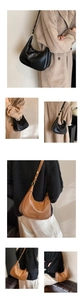 Détail de la texture en cuir ciré et de la forme de lune sur un sac à bandoulière vintage
