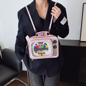 Retro pink TV shaped crossbody bag with No Signal design and adjustable shoulder strap