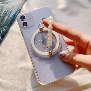Magsafe-Handyhalterung mit lila Glitzersternen und weißer Perlenkette im Detail ansehen
