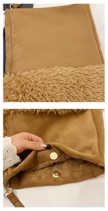 Detail of brown suede bucket bag with faux shearling trim and golden magnetic snap closure