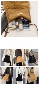 Internal view of suede bucket bag showing storage for tablet and cosmetics