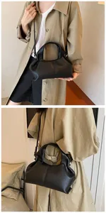 Details einer schwarzen Cloud-Tasche mit Litschimuster und verstellbarem Schultergurt