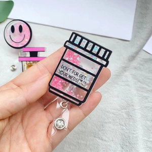 Nurse retractable badge holder with pink quicksand medicine bottle design and sequins