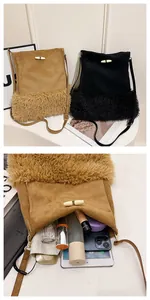 Detail of suede and faux fur bucket bag showing interior capacity for essentials