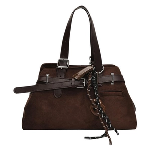 Retro dark brown matte tote bag with leather strap buckle and woven tassel detail