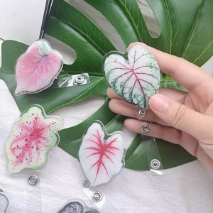 Acrylic retractable badge holder with colorful caladium leaf prints for nurses and students