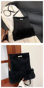 Detail of black suede and faux fur bucket bag with a yellow horn toggle closure