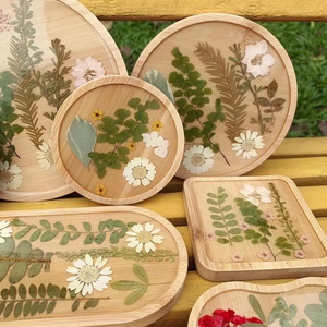 Handmade wooden tray with real dried flowers in clear epoxy resin for desktop decor