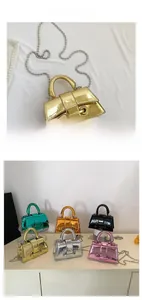 Detail of metallic mini trapezoid bag with H buckle and assorted color options