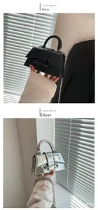 Detail of mini laser bags in black and silver featuring curved bases and chain straps