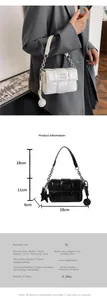 Detail view of woven leather shoulder bag with dimensions 18x11x6cm and metal chain strap