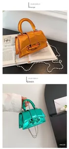 Close-up of orange and green mini bags in glossy metallic patent leather with chain straps