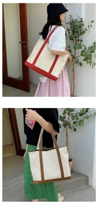 Detailed comparison of red and brown canvas tote bags in a stylish outdoor setting