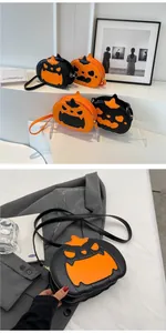 Detail view of pumpkin-shaped crossbody bag with quirky facial expressions and PU leather finish