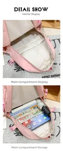 Detailed internal structure of pink school backpack with compartments for laptop and books
