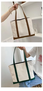 Detail of the durable canvas tote bag featuring premium leather trim and reinforced base