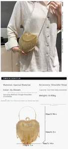 Detailed view showing dimensions and model wear for golden heart tassel evening clutch
