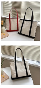 Close-up of minimalist canvas tote bags in red and black trim with structured details
