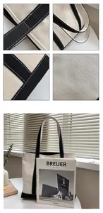 Detailed view of reinforced stitching and heavy-duty canvas texture on large tote bag