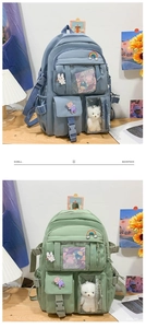 Detailed view of spacious nylon backpacks with cute bear charms and decorative badges