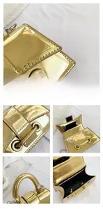 Macro shot of metallic gold mini bag with silver chain strap and flip magnetic closure