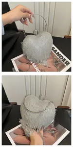 Macro detail of heart-shaped evening clutch with sparkling rhinestones and crystal tassels