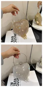 Detail view of heart-shaped rhinestone evening bags with metallic fringe in gold and silver
