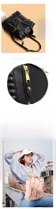 Detail view of motorcycle jacket style backpack with metallic zippers and studs