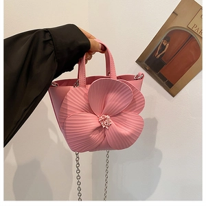 Pink PU leather handbag with 3D floral design and silver chain strap for women