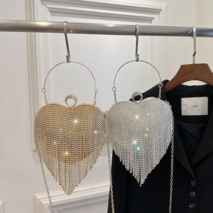 Sparkling heart-shaped rhinestone evening bag with elegant tassels in gold and silver