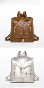Detail of creative biker jacket style backpacks in metallic silver and vintage brown