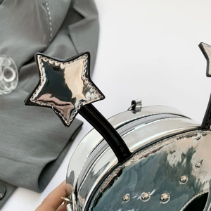 Silver Y2K alien star crossbody bag with punk rivets and reflective mirror finish
