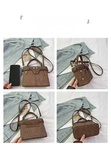 Detailed views of the brown textured bucket bag with denim pocket elements and silver hardware
