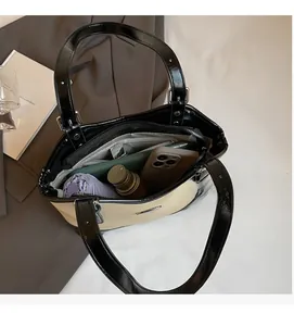 Top view of spacious contrast tote bag showing interior space with daily essentials