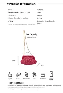 Detail view of pink straw woven crossbody bag with metal chain strap and size specs