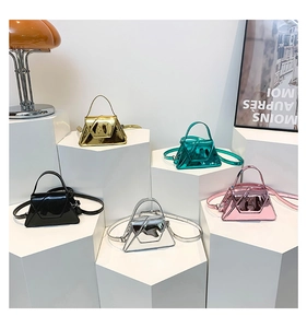 Detailed collection of mini patent leather shoulder bags in metallic gold and silver tones