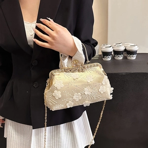 Elegant champagne gold embroidery handbag with 3D floral accents and metal chain strap