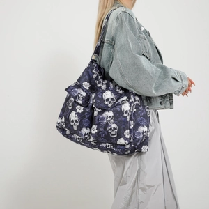 Large canvas tote bag with skull and purple rose print and multiple utility pockets