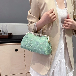 Mint green embroidered clutch bag with floral lace and gold frame for banquet events