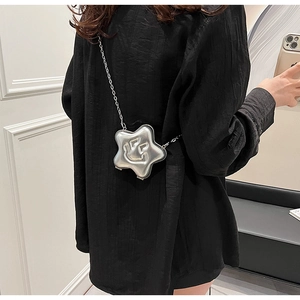 Silver star-shaped mini crossbody bag with a smiling face design and thin metal chain