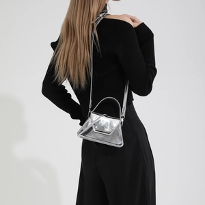 Metallic silver patent leather hobo bag for women with mirror finish and slim strap