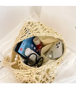 Top view of a woven tote bag showing large capacity for gadgets and summer accessories