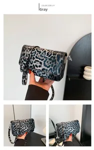 Three-angle views of a grey leopard print square shoulder bag with metal buckle detail
