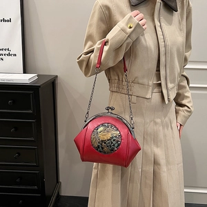 Elegant red leather shell bag with embroidery and metal chain strap for women