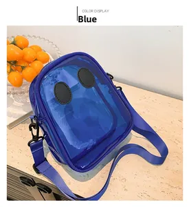 Close-up of blue transparent jelly bag with funny eye design on stone surface