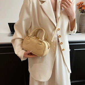 Creamy crocodile texture mini Boston handbag with heart accents and detachable strap
