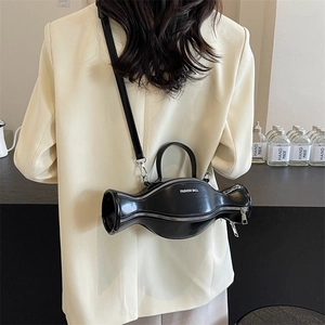 Sac à main noir sphérique unique avec double fermeture éclair et bandoulière