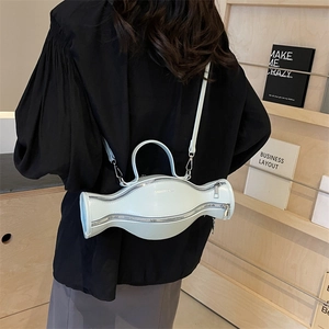 Sac à main bleu clair en cuir forme bonbon unique avec double zip et bandoulière