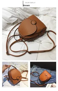 Detailed view of a brown pebbled leather mini backpack with zippers and round flap cover